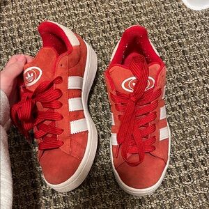 Red adidas campuses size 7 but run big. I am a size 8.5 and I fit in them